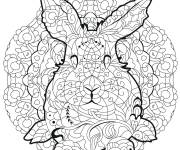 Coloriage P&acirc;ques mandala d&eacute;cor&eacute; avec un li&egrave;vre au centre