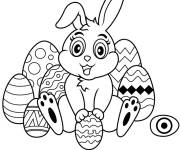 Coloriage Lapin avec beaucoup des oeufs de P&acirc;ques facile ps