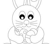 Coloriage et dessins gratuit Lapin avec &oelig;ufs de P&acirc;ques facile &agrave; imprimer à imprimer