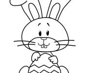 Coloriage et dessins gratuit Lapin de cartoon pour Pâques avec oeuf facile à imprimer