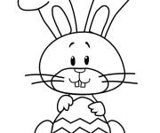Coloriage et dessins gratuit Lapin de cartoon pour P&acirc;ques avec oeuf facile à imprimer