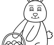 Coloriage Lapin tenant un panier de P&acirc;ques en ligne