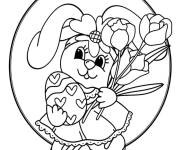 Coloriage Lapin tenant un &oelig;uf de P&acirc;ques avec des c&oelig;urs