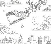 Coloriage Tra&icirc;neau de No&euml;l survolant l'horizon de la ville