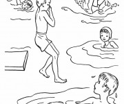 Coloriage Enfants s'amusent dans la mer