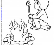 Coloriage Le petit Enfant mange en camping