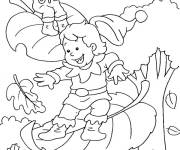 Coloriage Les gnomes en s'amusant avec les feuilles d'automne