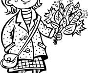 Coloriage Petite fille tenant un bouquet de feuilles