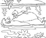 Coloriage Mowgli dans la foret tropicale