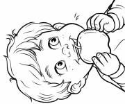 Coloriage Le garcon mignon mange une pomme