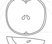 Coloriage Pomme coup&eacute;e en deux avec graines