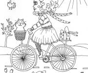 Coloriage Belle fille sur v&eacute;lo se balade dans la belle nature du printemps