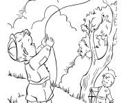 Coloriage Enfant fait voler son cerf-volant au printemps