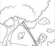 Coloriage Enfant sur une balan&ccedil;oire dans un arbre au printemps