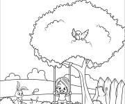 Coloriage La belle fille s'amuse en jouant sur une balan&ccedil;oire dans un arbre