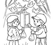 Coloriage Les enfants qui nourrissent les oiseaux au printemps