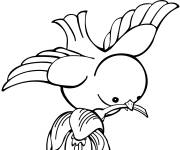 Coloriage Oiseau tenant une fleur au printemps