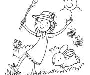 Coloriage Une fille et un lapin jouant en plein air