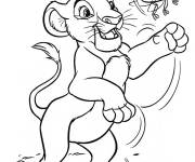 Coloriage Simba en jouant avec Scarab&eacute;e