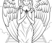 Coloriage Ange de Noel en pri&egrave;re dans l'escalier