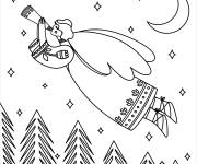 Coloriage Ange de Noel en volant sur la foret