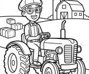 Coloriage Blippi avec son tracteur dans la ferme