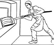 Coloriage Le chef met le pain au four