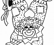 Coloriage Un clown acrobate en équilibre sur ses mains