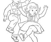 Coloriage Les petits enfants s'amusent en dansant