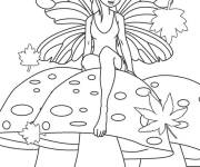Coloriage F&eacute;e avec des ailes de papillon sur champignon