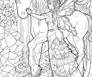 Coloriage F&eacute;e caresse la licorne