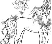 Coloriage Gar&ccedil;on f&eacute;erique avec licorne
