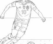 Coloriage Lamine Yamal joue au foot