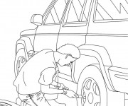 Coloriage Mécanicien change la roue d'une voiture