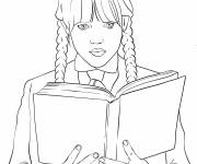Coloriage Mercredi Addams lisant un livre