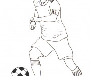 Coloriage Joueur de Foot en attaque