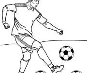 Coloriage Cristiano dribble le ballon