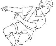 Coloriage Le footballeur tire le ballon vers les filets