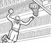Coloriage Un joueur de basket-ball qui tente un dunk