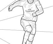 Coloriage Ronaldo de Real Madrid dribble le ballon