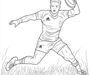 Coloriage Joueur de rugby attrape la balle