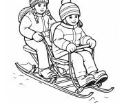 Coloriage Enfants faisant de la luge dans la neige coloriable