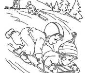 Coloriage Un couple d'enfants jouant &agrave; la luge en hiver