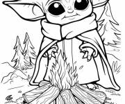 Coloriage B&eacute;b&eacute; Yoda allume le feu dans la foret