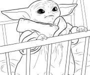 Coloriage B&eacute;b&eacute; Yoda dans le berceau
