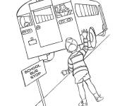 Coloriage Le gar&ccedil;on emm&egrave;ne sa soeur au bus